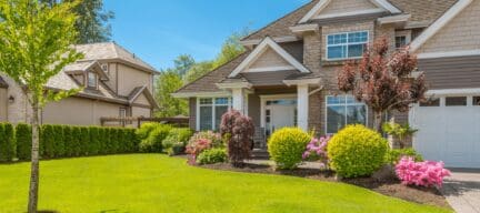 the front of a house with colorful and tidy curb appeal landscaping