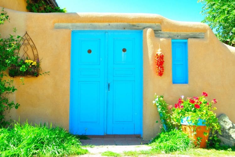 invite visitors in with a curb appeal-friendly front door that pops.