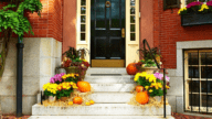 a photo of a house's front door decorations for halloween