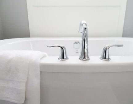 A bathtub in a home that has been staged.