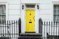 Painting a door yellow is quick and easy curb appeal.