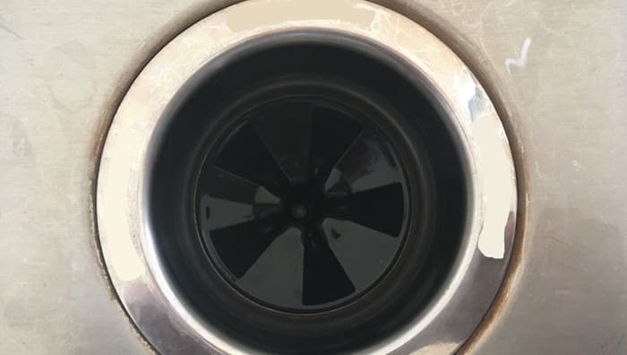 A garbage disposal that is maintained in a home.