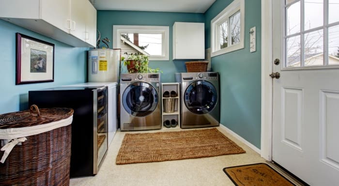 A professional shot of a laundry room that is being marketed in a home.