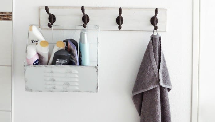 Toiletries hanging in a bathroom after moving.