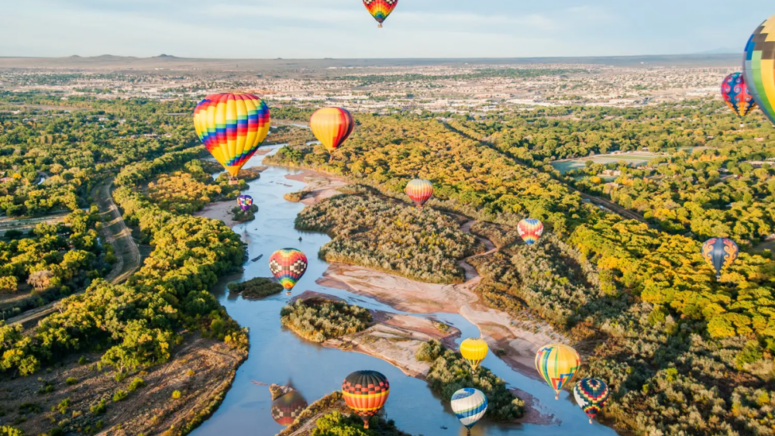 Hot air balloons in Albuquerque where houses are selling fast.