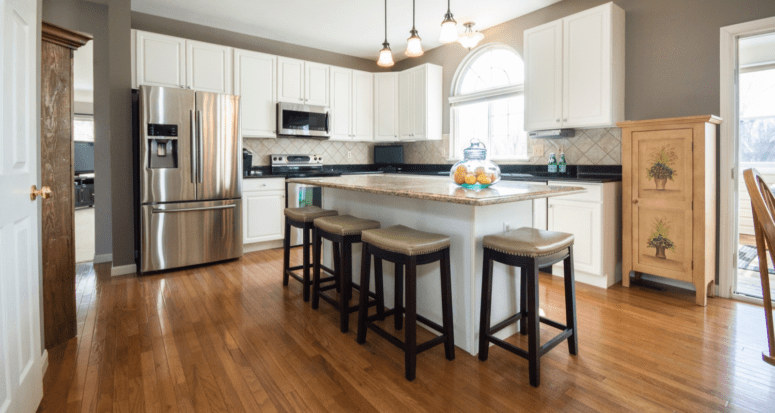 A kitchen with granite countertops that has increased value.