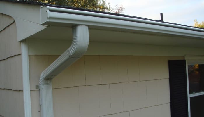 New gutters on a home to increase home value.