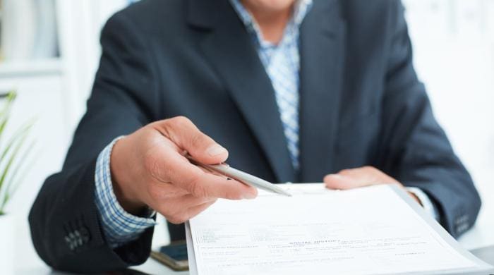 Mortgage lender pre-approves a homeowner for a new loan.
