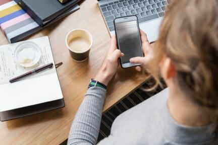 woman researching organization methods for home maintenance records