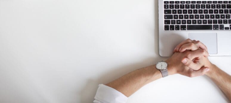 man researching how to decide best offer for house