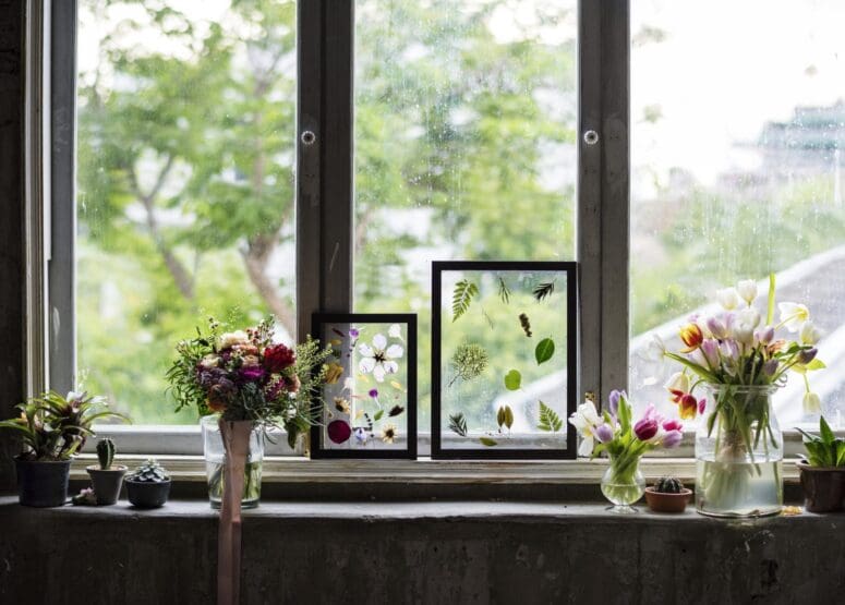 Spring home with flowers and maintained windows.