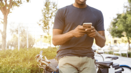 A man outside on his phone with questions on the home inspection.