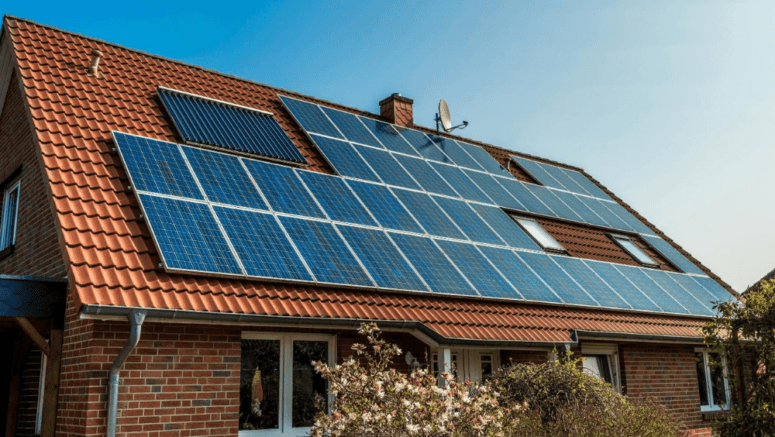 Solar panels on a house that is for sale.