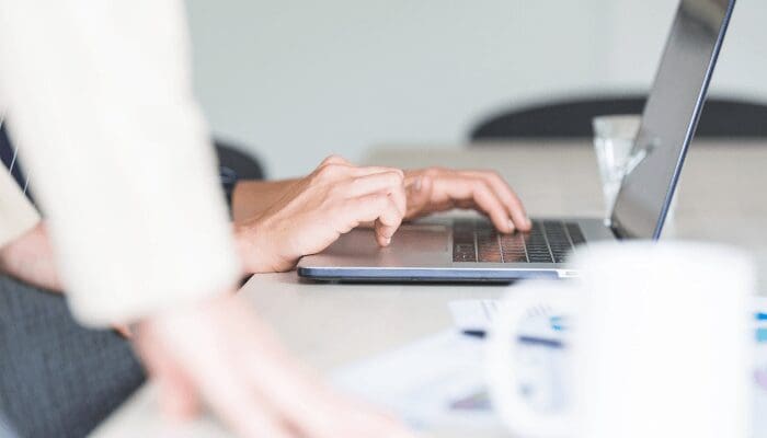 A couple using a computer keep the house in a divorce.