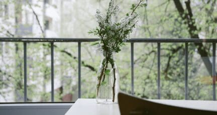 Flowers on a table in a downsized home.