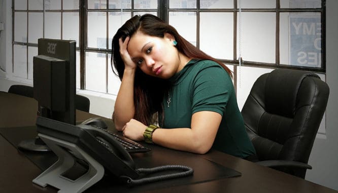 Real estate agent at her desk.