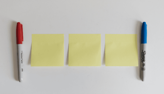 Post-its used to create real estate client reviews.