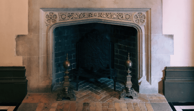 A fireplace in an older home.