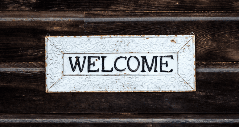 A welcome sign in a house for sale.