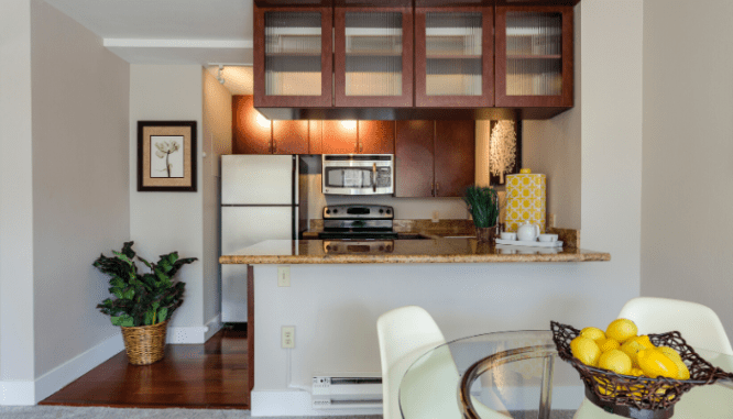 The kitchen inside a condo.