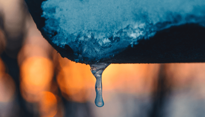 Water dripping off a house.