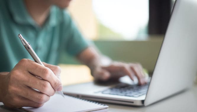 A man touring houses online so he can buy a house during coronavirus