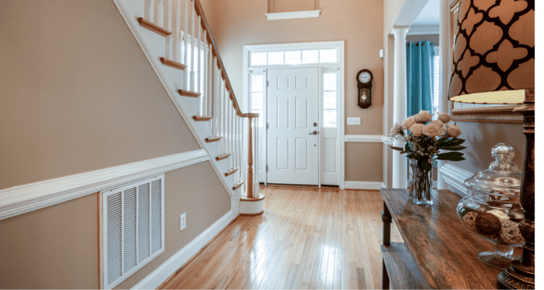 The interior to the entrance of a house.