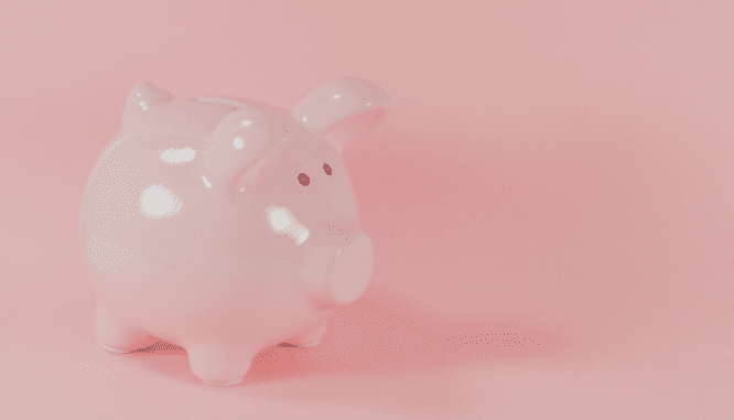 A pink piggybank on a pink background.