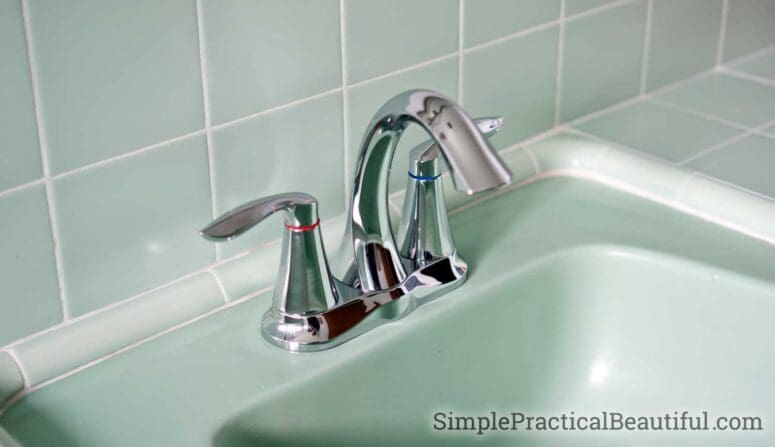 A faucet in a DIY bathroom remodel.