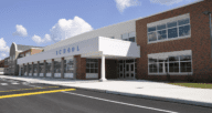 A school building from the front, which will have an impact on property values.