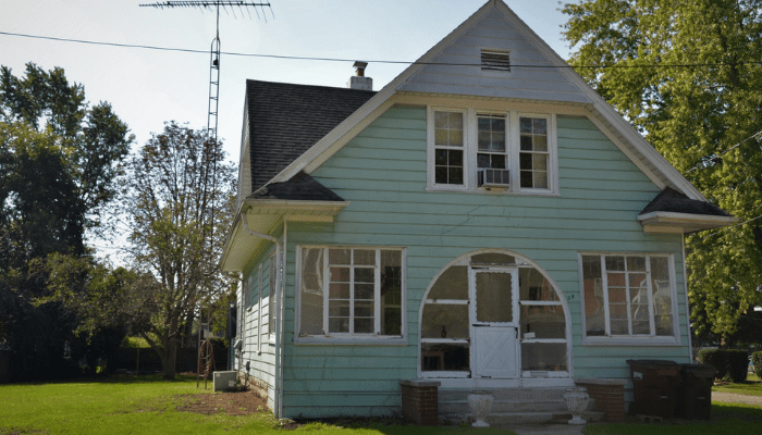 A house that needs work in order to sell.