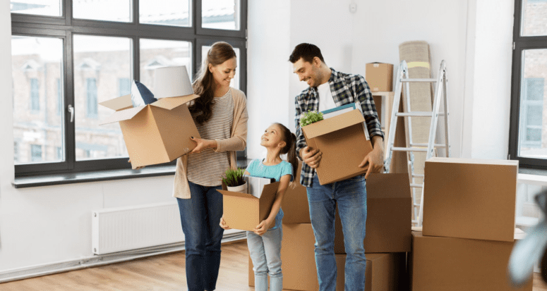 Parents and a kid getting settled into a new house.