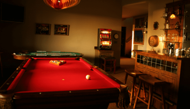 A pool table in a home with a low appraisal.