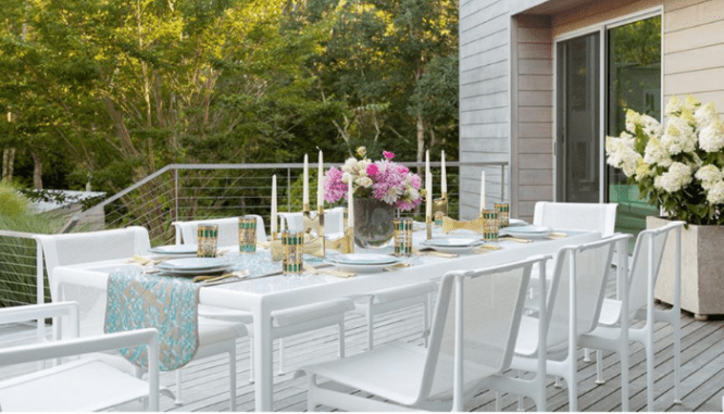 A dining table set up as a backyard patio idea.