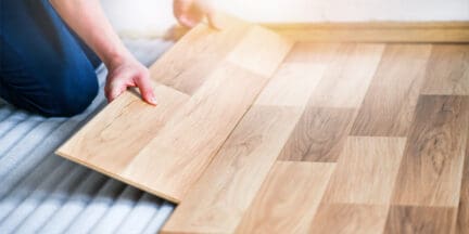 Laminate flooring being installed that will increase home value.