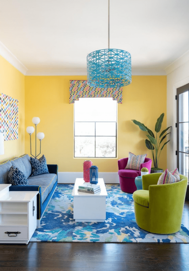 A room with a colorful window valence that is not out of style.