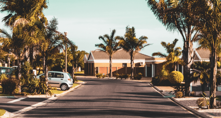 A street near a house you can buy in the suburbs.