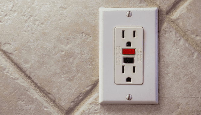 A GFCI outlet in a Riverside house for sale.