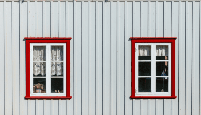 Windows in a house that will need home improvements before resale.