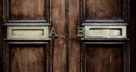 Two slots in a door labeled A and B to show the concept of comparing things that seem similar or equal, like mortgage rates