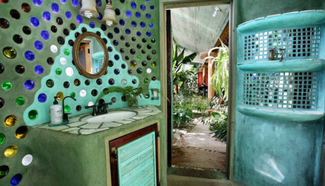 A bathroom in an earthship home.