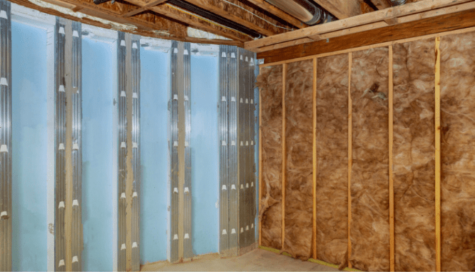 A basement with insulation that will improve energy efficiency.