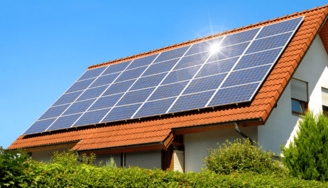 A house with solar panels that improve energy efficiency.