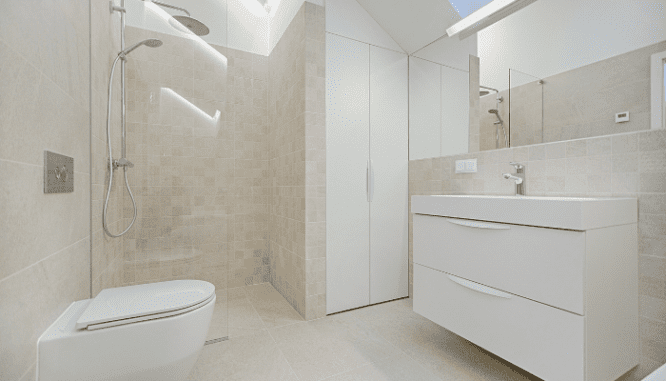 A bathroom in a house for sale without a bathrub.