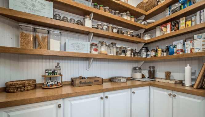 An organized pantry that was added to the home.