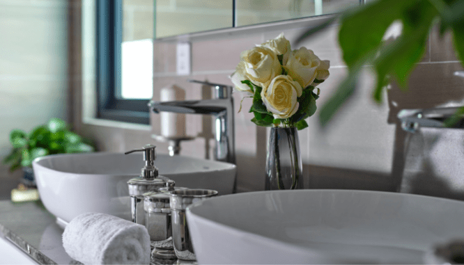 A double sink vanity in a bathroom.