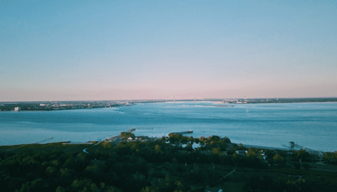 A photo depicting houses to buy next to water in Charleston.