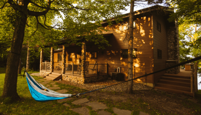 A house and hammock to demonstrate a house you could buy in Salt Lake City.