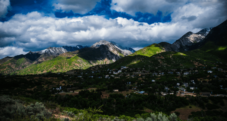 An image of mountains and a house to buy in Salt Lake City.