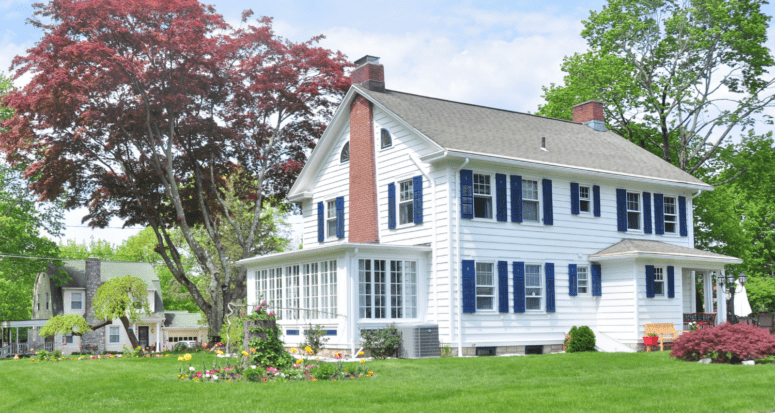 A house and lawn used to depict the residential appraisals process.